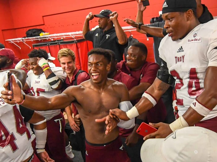 troy-locker-room-celebration.jpg